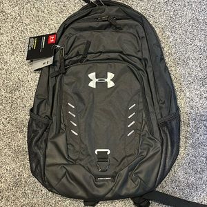 Under Armour Game Day Backpack, NWT, black. Plenty of pockets, sporty & sleek